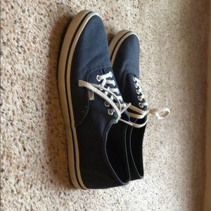 Vans muted blue lace up shoes.
